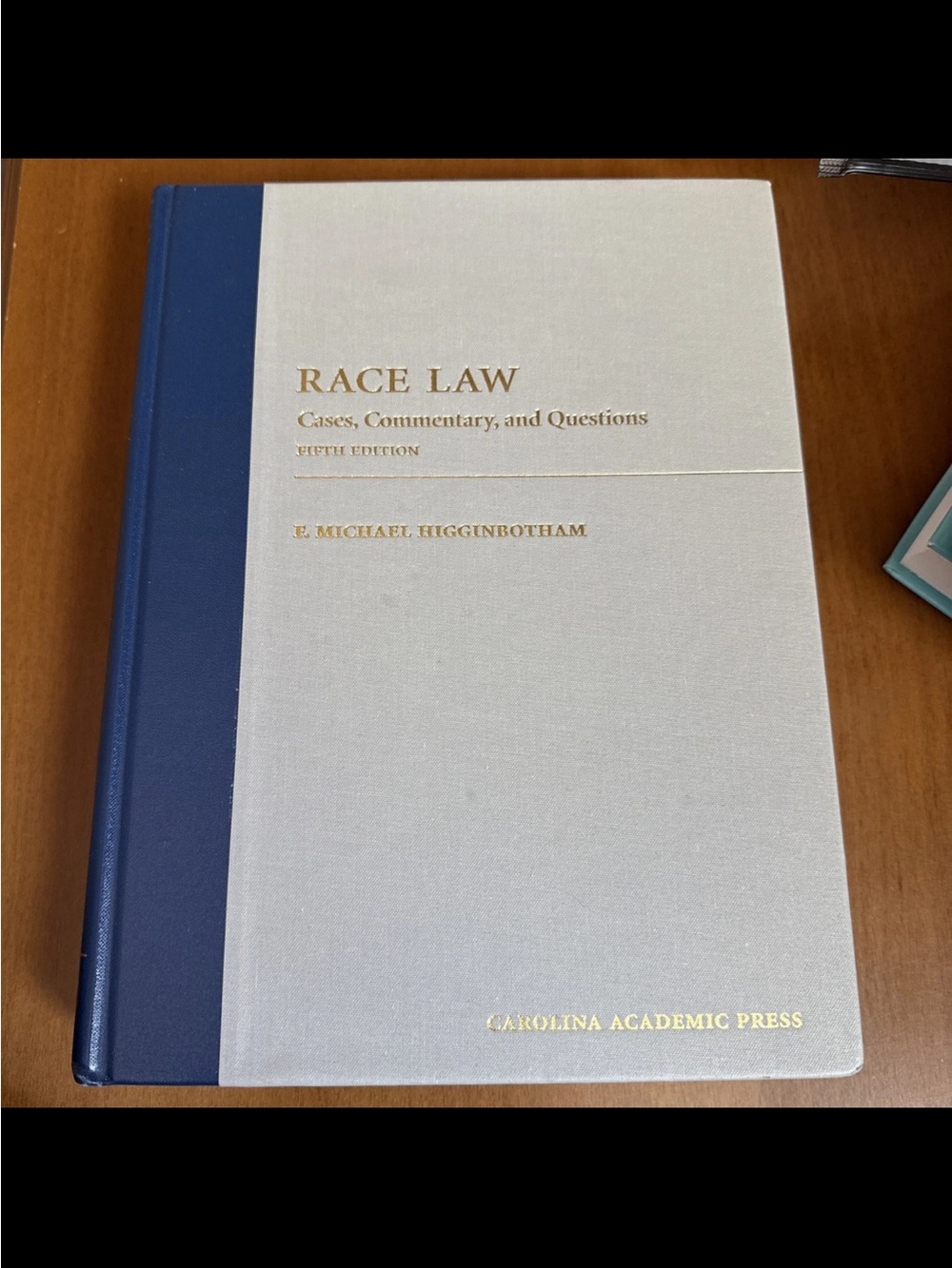 Race Law Hardcover Textbook in Blue and Cream with Gold Stamping